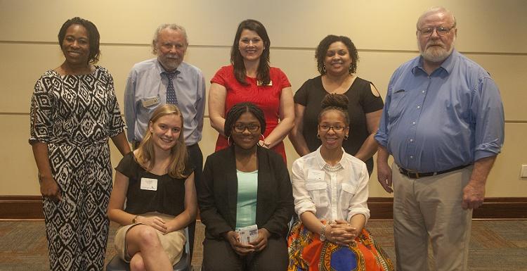 The finalists of the USA Public Speaking Contest are, seated from left, third place winner Faith Wheeler of Murphy High School; first place winner Siddiqah Abdullah of Murphy High School and second place winner Marie Doyle from the Alabama School of Mathematics and Science. Standing from left are USA communications faculty Dr. Reggie Moody, associate professor; Katherine Rigsby, instructor; Megan Sparks, senior instructor; Dr. James Aucoin, professor and chair; and Dr. April Dupree Taylor, assistant professor.