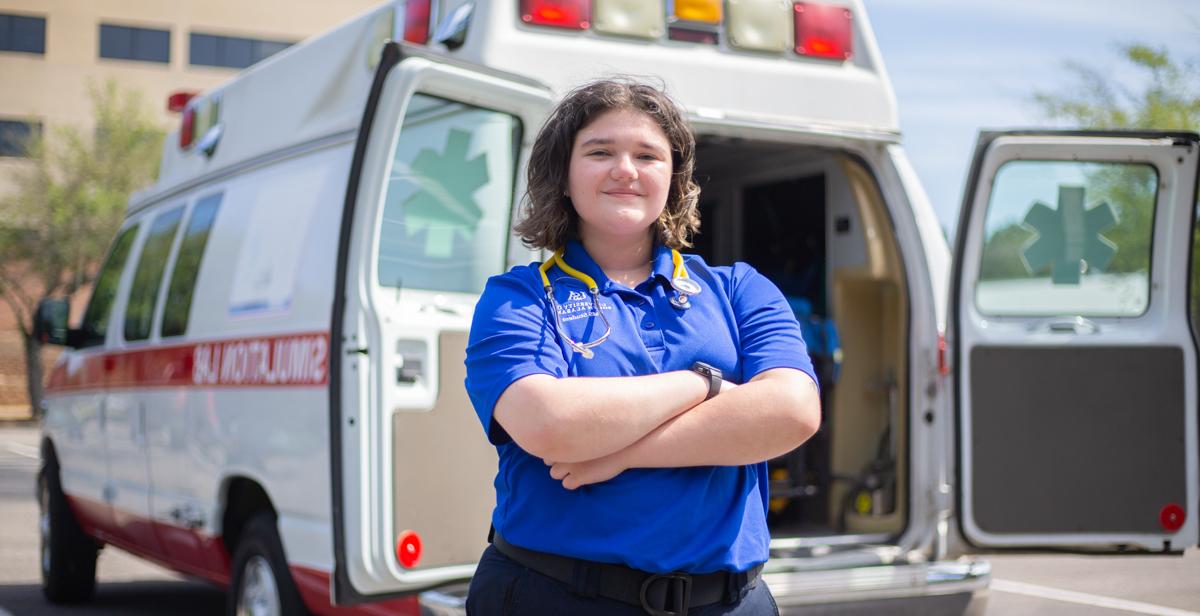 Chloé Knippers works part-time for a Mobile ambulance company. Here, she is in front of the University of South Alabama's Mobile Simulation Lab.  data-lightbox='featured'